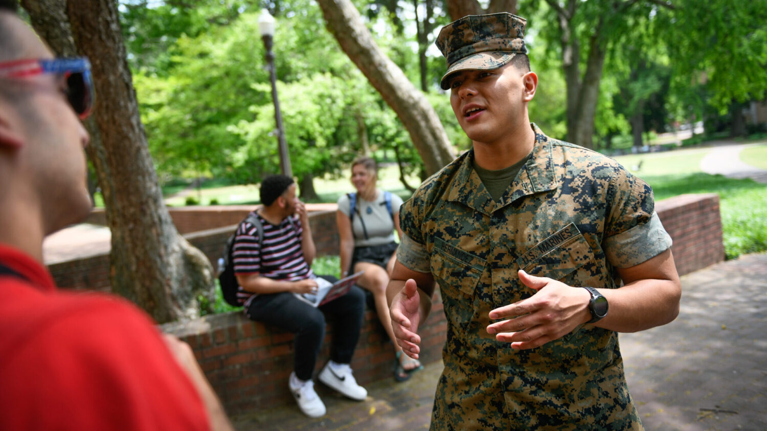 An ROTC student talks with another