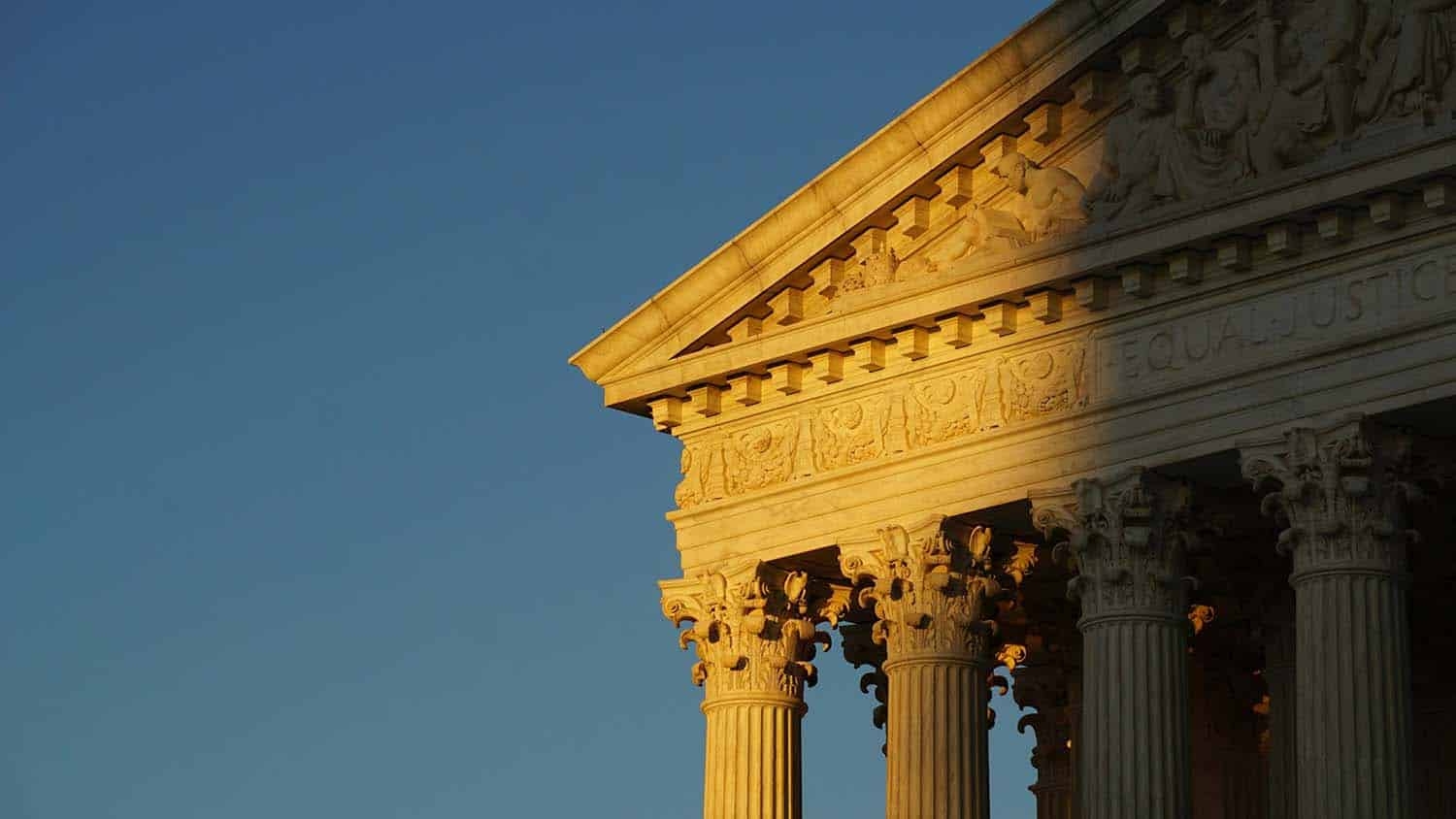 photo shows the front facade of the U.S. Supreme Court building